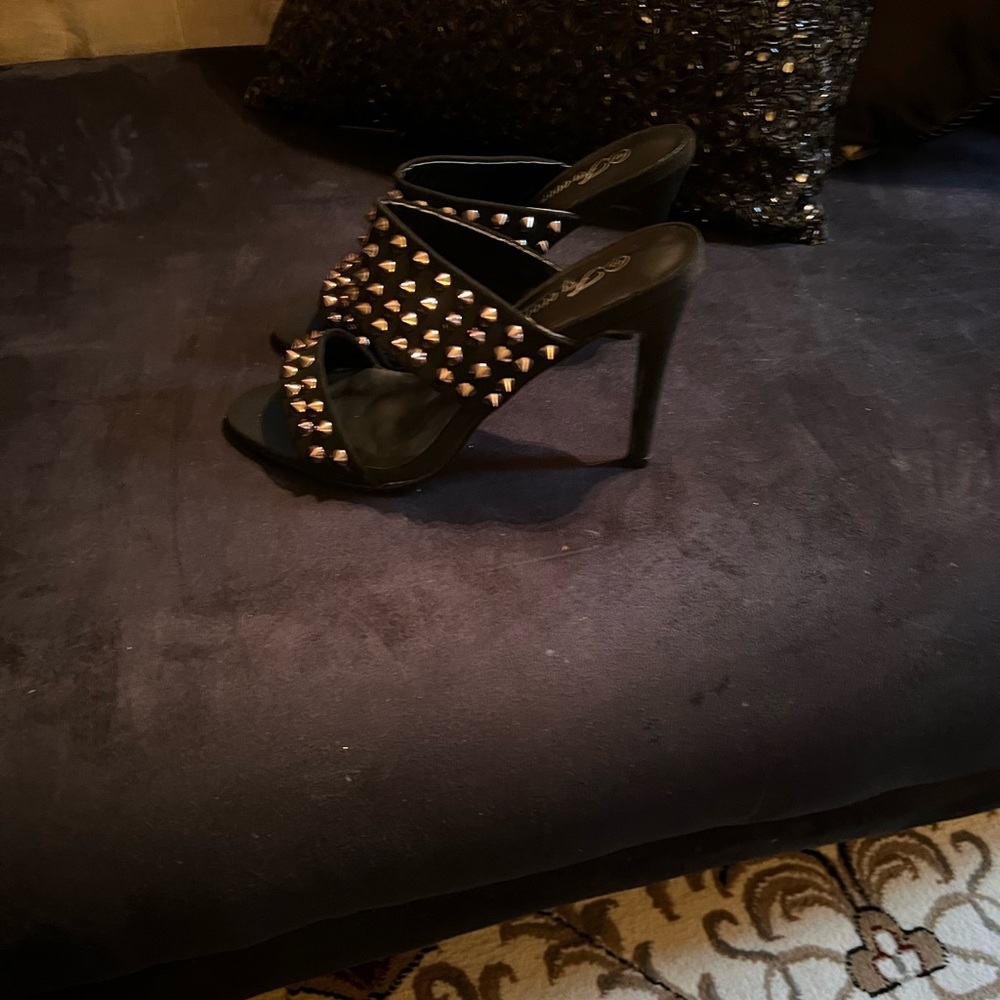 Black mules with silver studs. 4 inch heal.